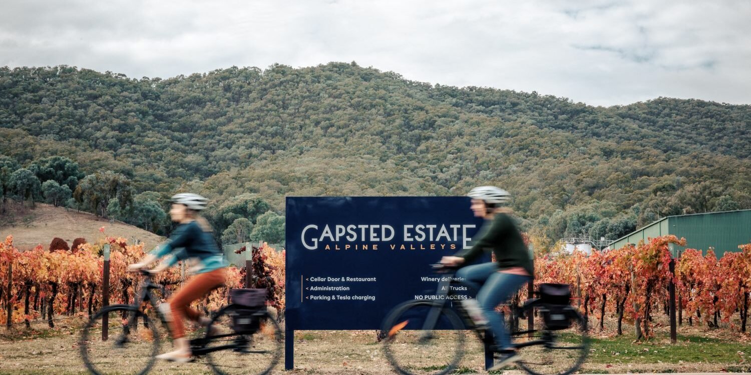 Riding the Murray to Mountains Rail Trail through Gapsted, near Myrtleford